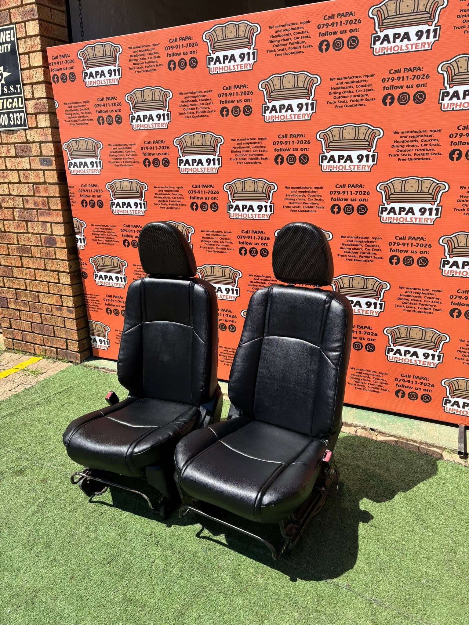 Pair of reupholstered black leather car seats — auto upholstery by Papa911 Upholstery, Gauteng