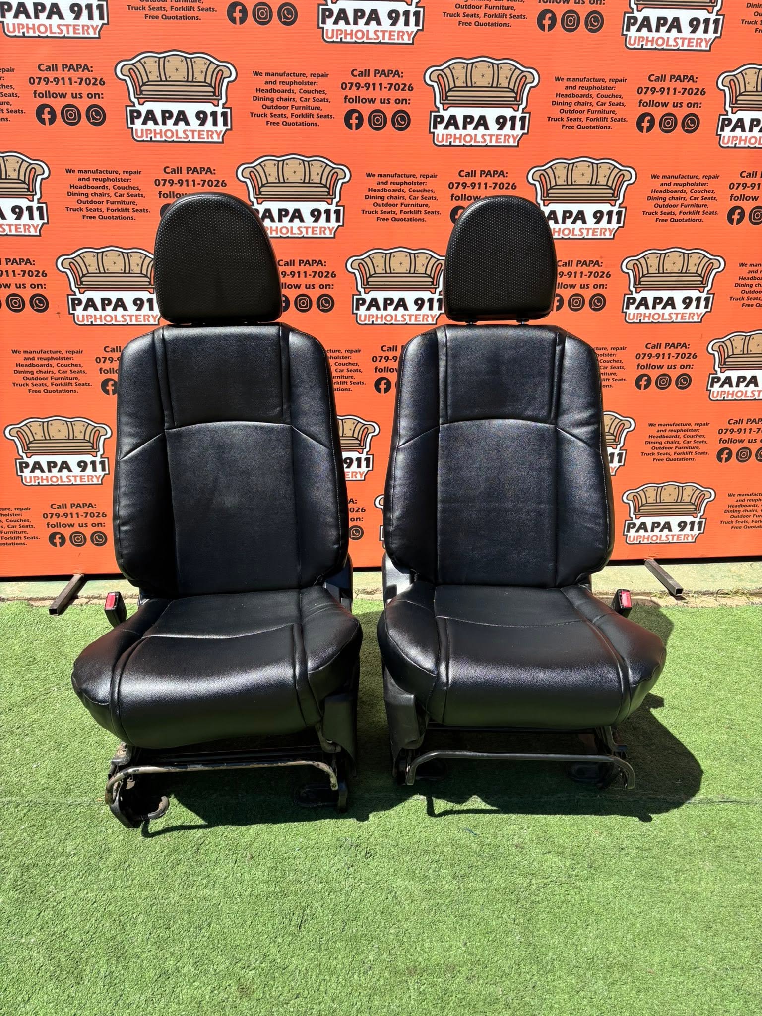 Front view of reupholstered black leather vehicle seats by Papa911 Upholstery, Alberton, Gauteng